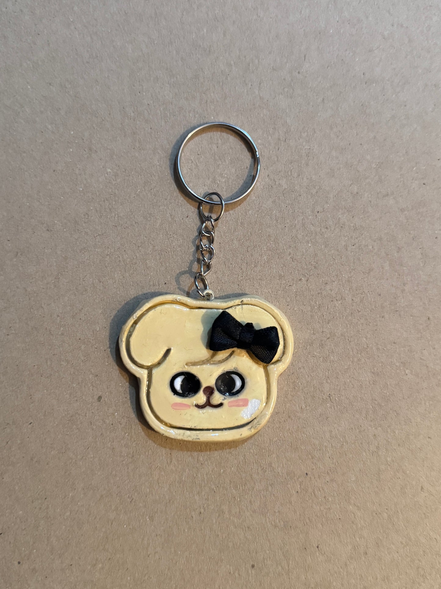Wonky STRAY KIDS bow clay character Keychain - PuppyM